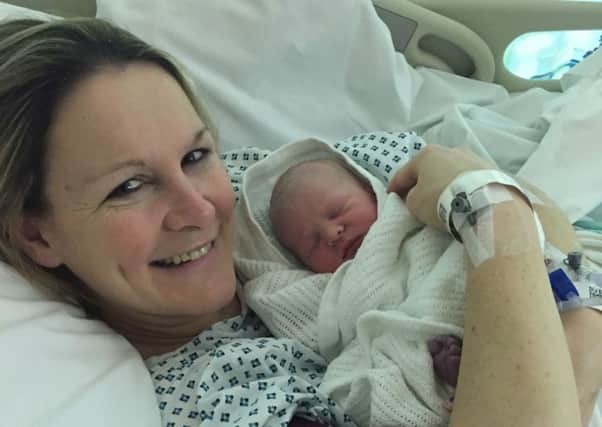 Claire Lomas with her new baby girl Chloe