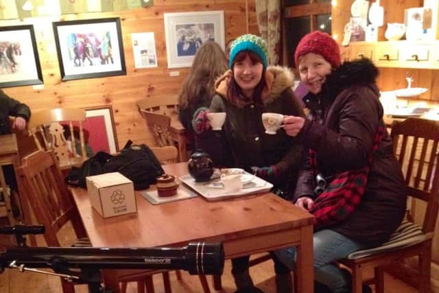 Angela and Jane Johnston with a telescope, cuppa and four legged assistant Noodle PHOTO: Supplied