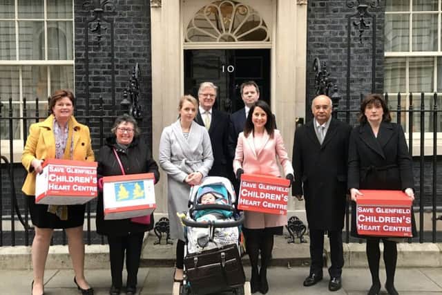 A delegation delivers a 130,000-name petition to 10 Downing Street as part of a campaign to keep the children's heart unit open at Glenfield Hospital in Leicester EMN-171002-103756001