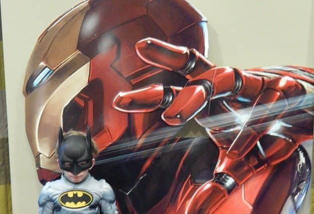 Man of iron...one young Batman fan with an Iron Man backdrop PHOTO: Supplied