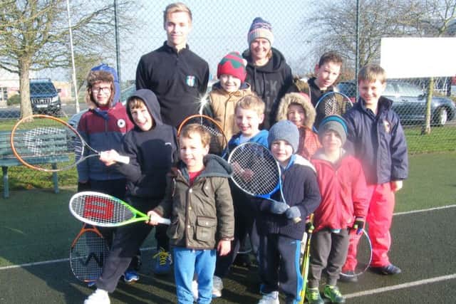 Some of the younger children at the coaching camps with coaches Di Burdett and Sam Dryell. EMN-170214-164233002