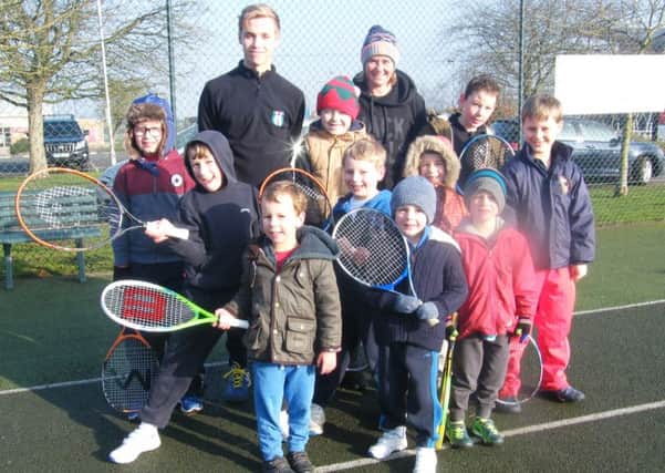 Some of the younger children at the coaching camps with coaches Di Burdett and Sam Dryell. EMN-170214-164233002