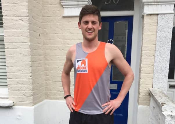 Freddie Allen in his Brooke running vest ahead of the London Marathon PHOTO: Supplied
