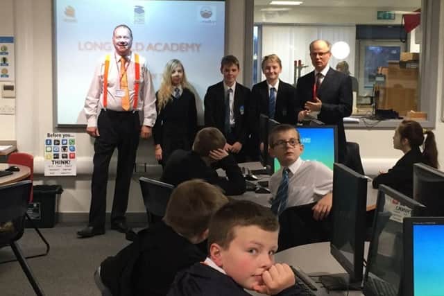 Martin Reason (right) introduces the programme to students PHOTO: Supplied