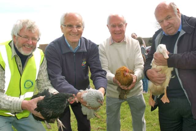 Rotary District Govenor Geoff Blurton (2nd left) gets set to release the hens and ducks with fellow Rotarians John Clayton, Keith Yates and David Morris at the 2016 Scalford Aurora Olympecks PHOTO: Tim Williams