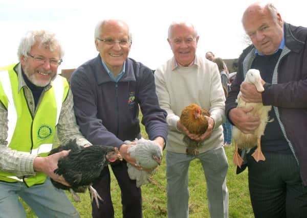 Rotary District Govenor Geoff Blurton (2nd left) gets set to release the hens and ducks with fellow Rotarians John Clayton, Keith Yates and David Morris at the 2016 Scalford Aurora Olympecks PHOTO: Tim Williams