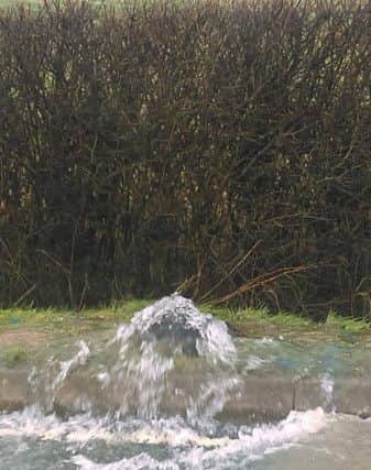 Water floods Saxby Road from a burst water pipe this afternoon
PHOTO DONNA KETTELL EMN-170221-171455001