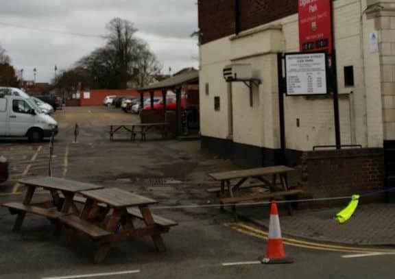 The King's Head car park is closed off after slates crashed down in high winds during Storm Doris EMN-170223-154506001