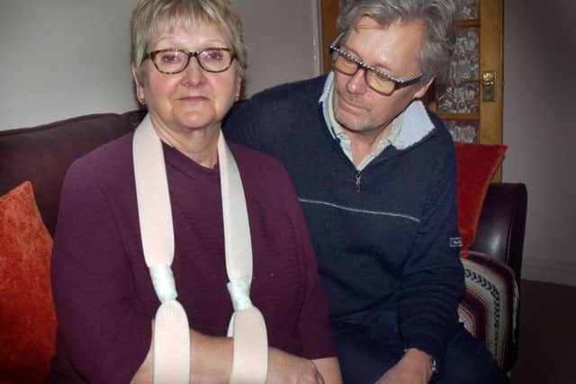 Margaret Hainsworth, who broke her arm after tripping over a paving stone in Melton, with husband Robin EMN-170227-144231001