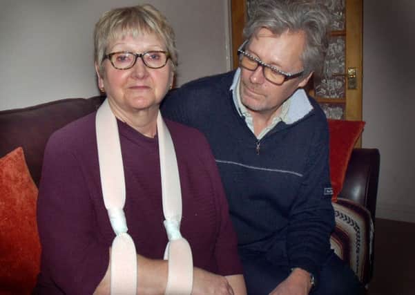 Margaret Hainsworth, who broke her arm after tripping over a paving stone in Melton, with husband Robin EMN-170227-144231001