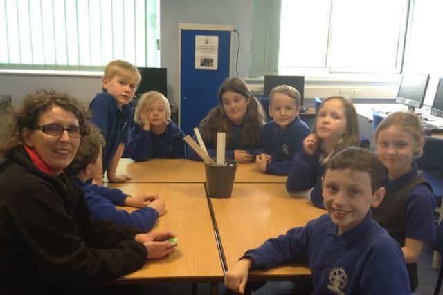 Children in the eco team talk to Nicola Craven from The Woodland Trust PHOTO: Supplied