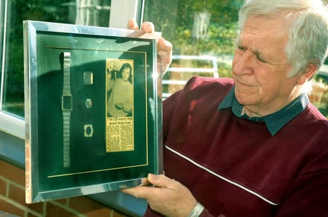 Brian Gibbons, who survived the Zeebrugge ferry sinking in 1987, with remains of the watch which helped save his life and the a framed article from a Melton Times report on the incident EMN-170703-094217001