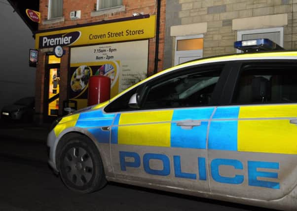 A police car parked outside Craven Street Stores on Wednesday evening following an armed robbery.
PHOTO Jonathan McGrady/JM News