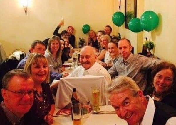 Jackie (back right) and her gym buddies pose enjoying their curry night PHOTO: Supplied