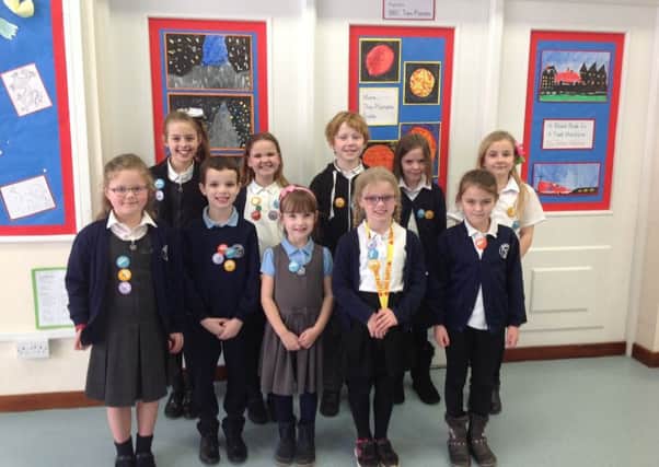 Pupils from Swallowdale Primary School wearing their Buddy Badges given to them by the NSPCC PHOTO: Supplied