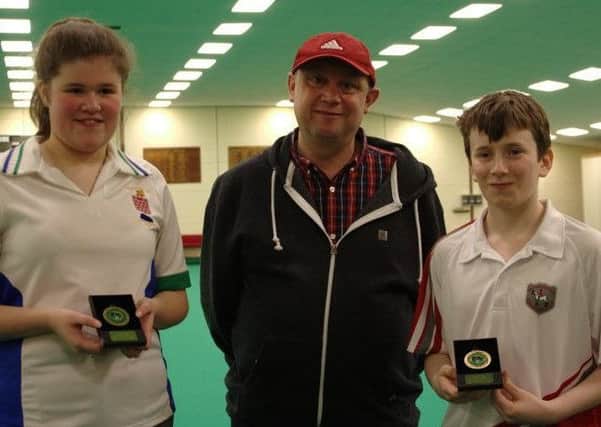 Alex Warrington and Alice Atkin (Church Gresley) receive their third-place medals EMN-170703-172507002