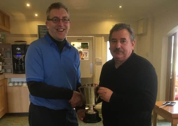 Chris Radford presents the Autumn Trophy to Jack Inguanta EMN-170314-152004002