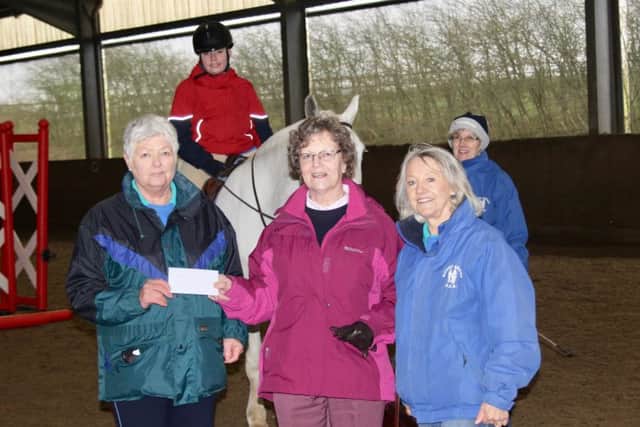 More than £2,000 is presented to the Mount Group RDA at Somerby by Birstall Golf Club's ladies' section EMN-170320-110440001