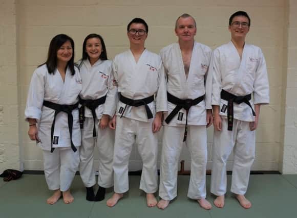 And dad makes five. The Artingstall family of first dan black belts EMN-170323-152632002
