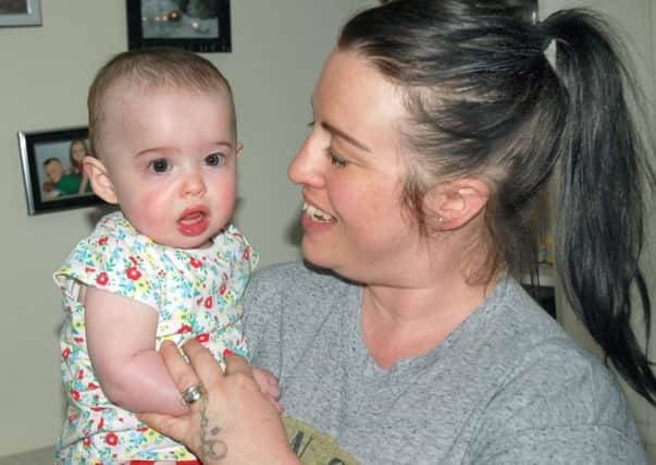 Adele Pedley and daughter Leia, who is recovering from a rare heart defect, at their Melton home EMN-170329-092620001