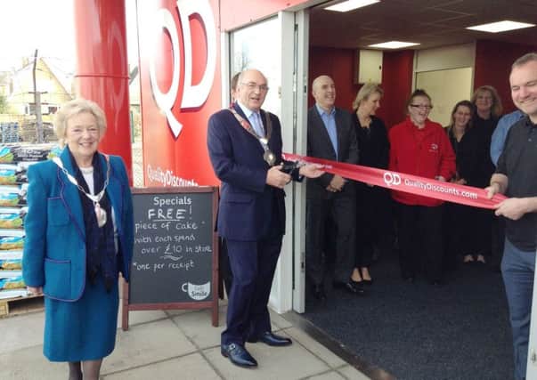 Mayor of Melton, Councillor David Wright, with wife Maureen, officially opens the new QD store in Scalford Road, Melton EMN-170331-122932001