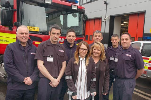 Katie Pease, with mum Georgina, thank Melton firefighters for their response when she was left badly injured and trapped in the wreckage of her car after a collision near Melton EMN-170404-173205001
