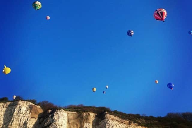 Balloons over Dover at the start of the world record attempt across the English Channel EMN-170704-161733001