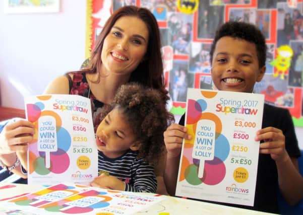 Rainbows family Helen, Kelis (3) and Curtis (9). Kelis benefits from the care of Rainbows.