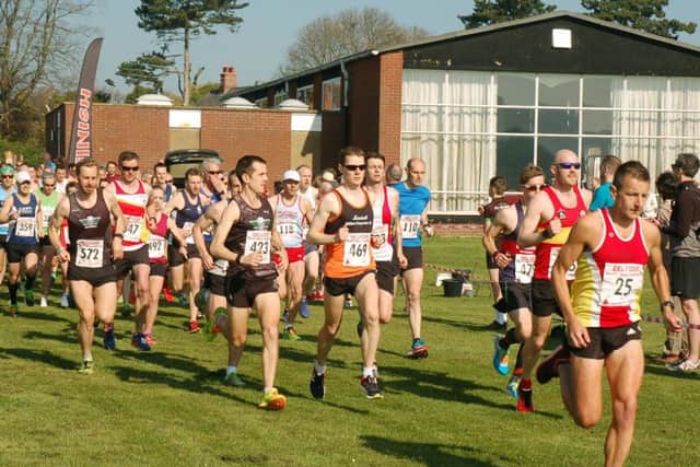 Belvoir Half Marathon winner Stewart Spencer (25) hits the front at the very start EMN-171104-124112002