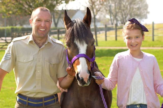 Ben Moore, who is riding a charity flat race, with daughter Grace and her pony Bella EMN-171004-132406001