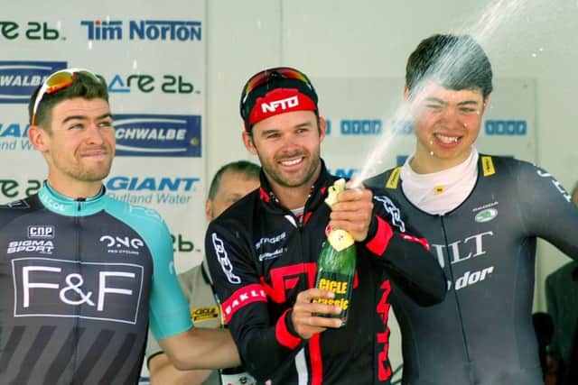 Champagne moment for 2015 winner Steele Von Hoff flanked by runner-up Chris Opie (left) and Harry Tanfield EMN-170413-173530002