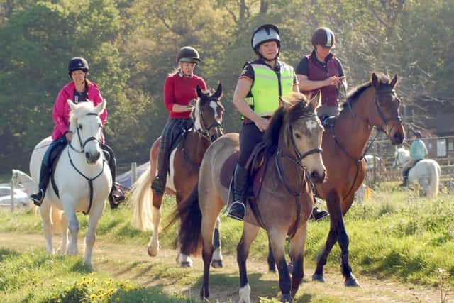 Macmillan riders set off into the countryside PHOTO: Tim Williams
