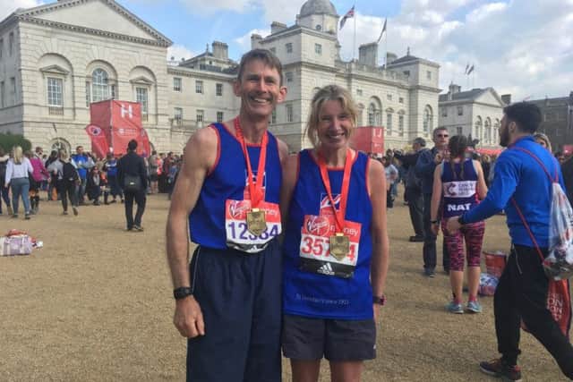 Jeremy Greville-Heygate and wife Emma showing off their medals PHOTO: Supplied
