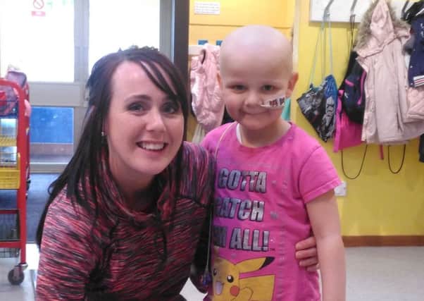 Melton girl Evie Moore (4) who is battling leukaemia, with her teacher from St Mary's Primary School, Hannah Cheyney EMN-170428-134705001