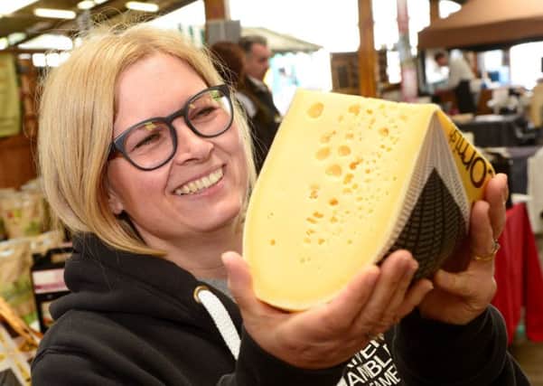 656463-02 : Â©Lionel Heap : News : 2017 Artisan Cheese Fair : Rosea Reynolds with some multi award winning Cornish Jack Cheese. EMN-170205-095025001