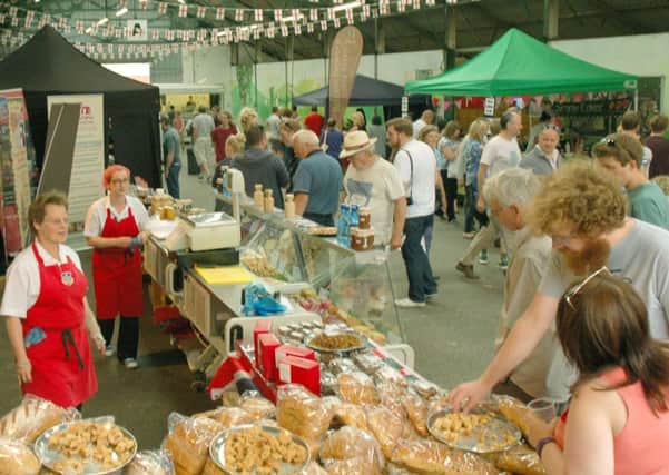 Crowds at Melton Cattle Market sample a tempting variety of pies, pastries and bread PHOTO: Tim Williams