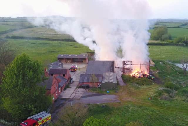 Firefighters tackle a blaze at a barn which contained 200 bales of hay, in Nottingham Road, Melton.
PHOTO Mark from aerialview360 EMN-171005-132702001