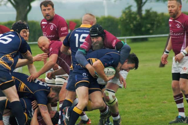 Action from County Cup final. EMN-170905-095037002