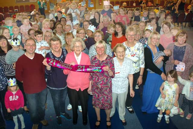 Founder Janet Gilchrist celebrates with mums and toddlers at the playgroup PHOTO: Tim Williams