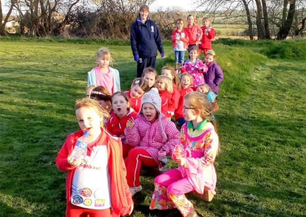 1st Asfordby Rainbow Girlguides complete the Mile for Macmillan challenge PHOTO: Supplied