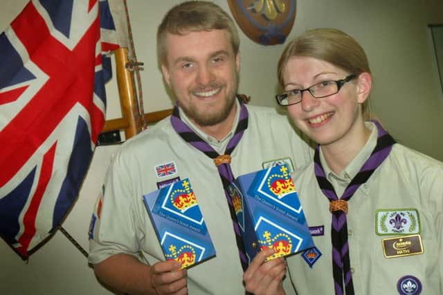 Tom Hazeldine and Rebecca Watts, who are Cub Scout Leaders in the 4th Melton Mowbray Darwin Cubs, show off their Queens Scout Awards, the highest achievable youth award in Scouting EMN-170516-102612001