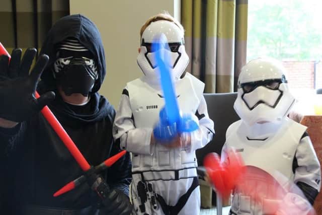 Youngsters practise some light saber skills PHOTO: Supplied