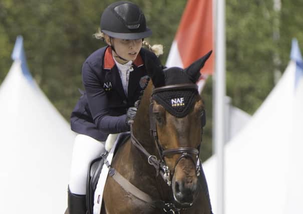 Aimee and Never Last had just one pole down in their two rounds EMN-170518-101844002