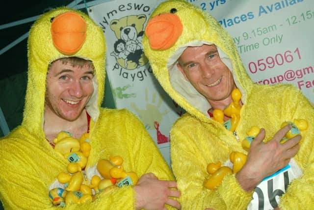 Josh Taylor and Steve Owen at the duck raffle stall raising money for Wymeswold Playgroup PHOTO: Tim Williams