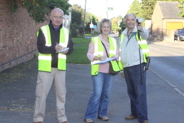 Volunteers use a speed gun as part of Wymeswold Community Speedwatch campaign PHOTO: Supplied EMN-170522-163017001