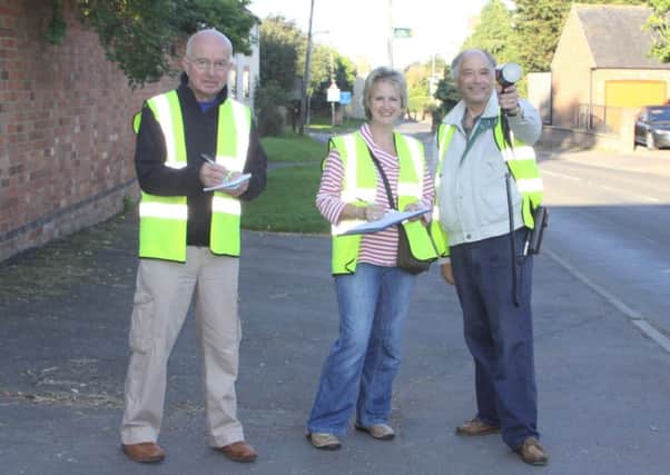 Volunteers use a speed gun as part of Wymeswold Community Speedwatch campaign PHOTO: Supplied EMN-170522-163017001