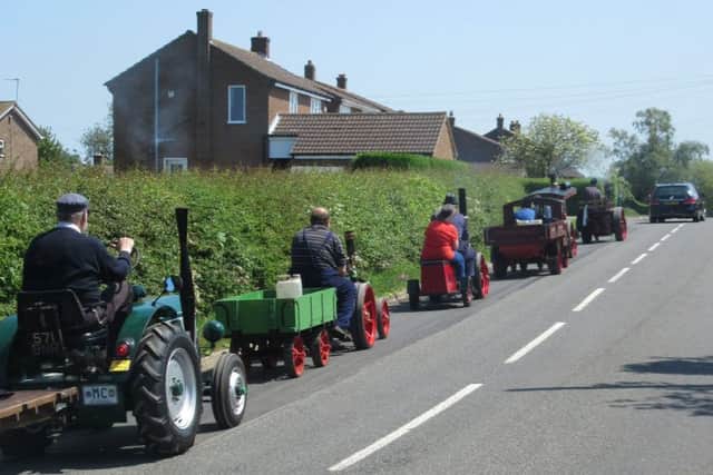 Three traction engines, a steam lorry and a miniature Field Marshall tractor set off from the sports field on a parade through the village PHOTO: Supplied