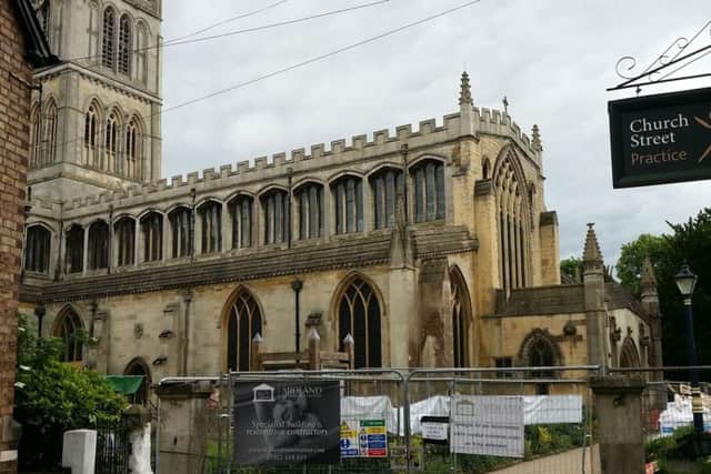 The fenced off area around St Mary's Church in Melton where major renovation work is going on until November EMN-170530-182524001
