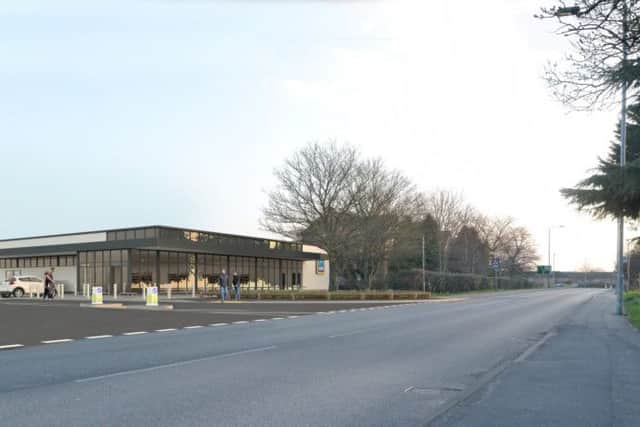 Artist's impression of the new Melton Aldi store which is taking shape on a site on Leicester Road EMN-170526-160330001