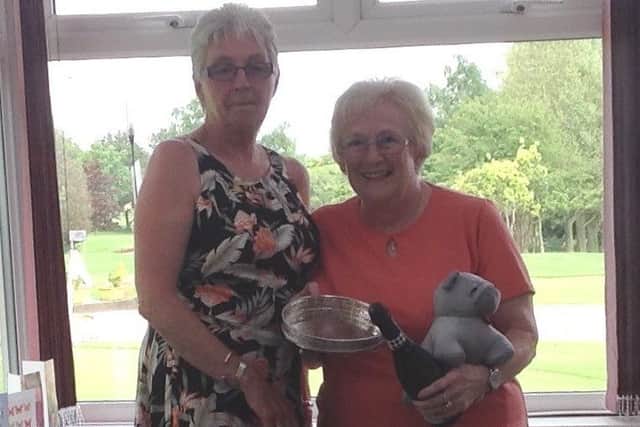 Chris Cook (left) with Lady Presidents Day overall winner, Kathie Finn. EMN-170530-165601002